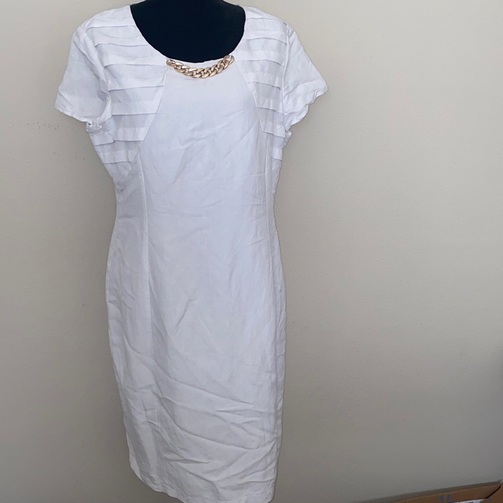Appraisal white dress 55% linen 45% viscose material, no need for dry cleaners